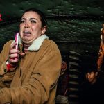 WOT-scared-woman-with-phone